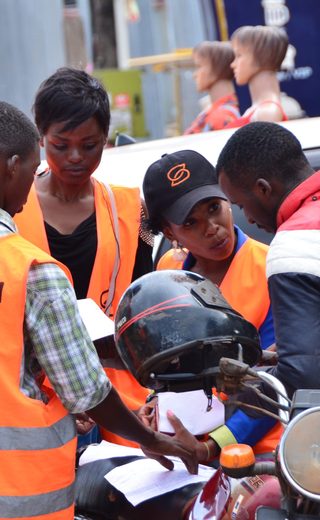 Kijoh field activation team briefing boda-boda riders in Kampala